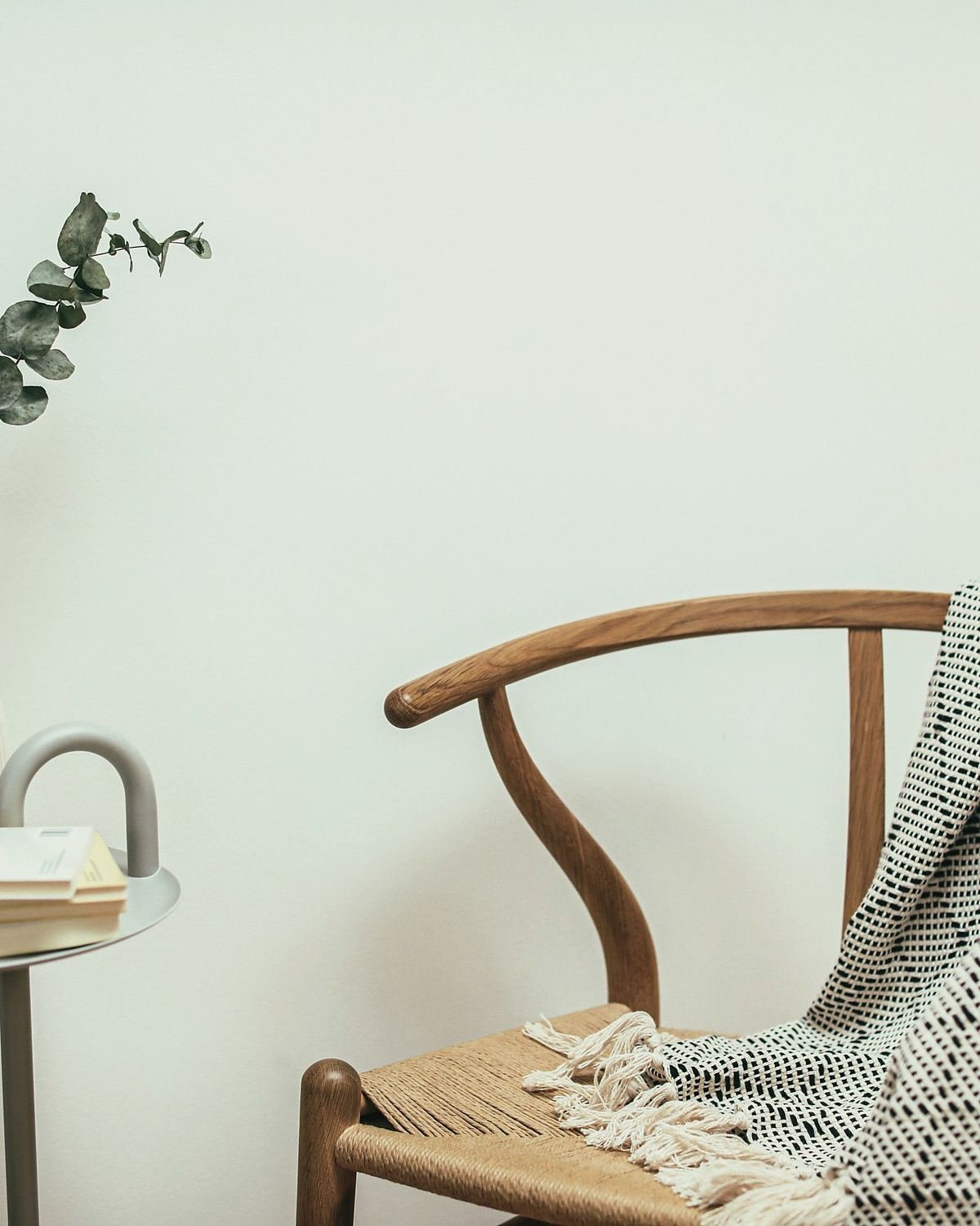 A quiet corner with a wooden chair and soft natural light